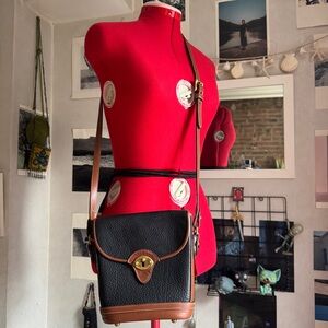 Dooney & Bourke Pebble Leather Crossbody bag with Brown Trim and Gold Hardware